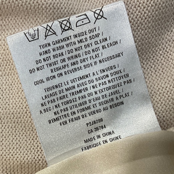 Elegant Cream Sweater with Silver Embellishments - Picture 10 of 10